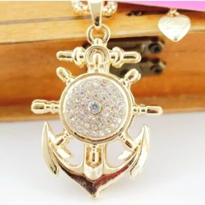 Gold crystal anchor pendant necklace